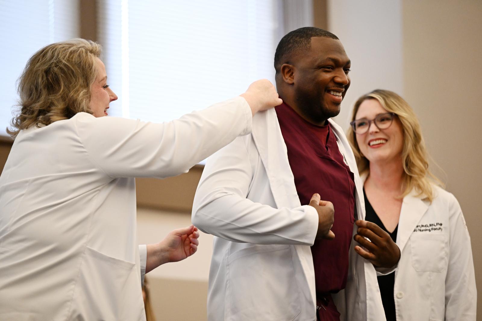 Nursing students at white coat ceremony