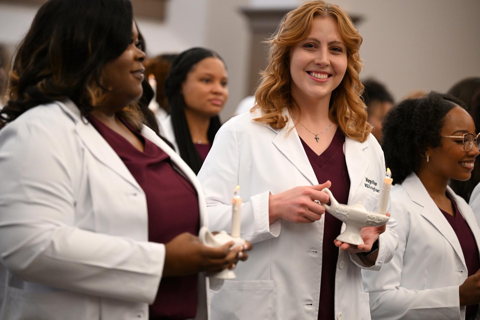 Nursing students at white coat ceremony
