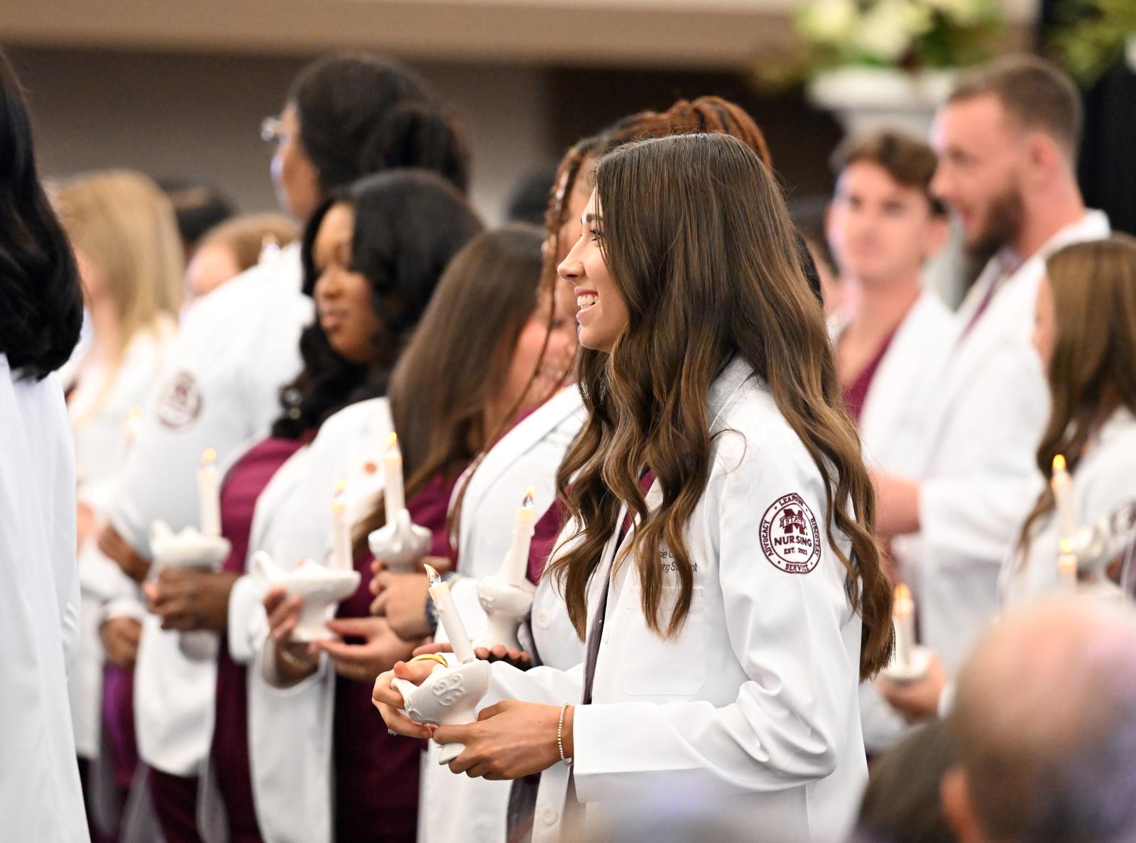 MSU PHOTO ID: MSU-Meridian students in the Master of Science in Nursing cohort recently were given Nightingale Lanterns during the White Coat Ceremony, a rite of passage that signifies students are ready to enter the clinical phase of their education. (Photo by Marianne Todd)