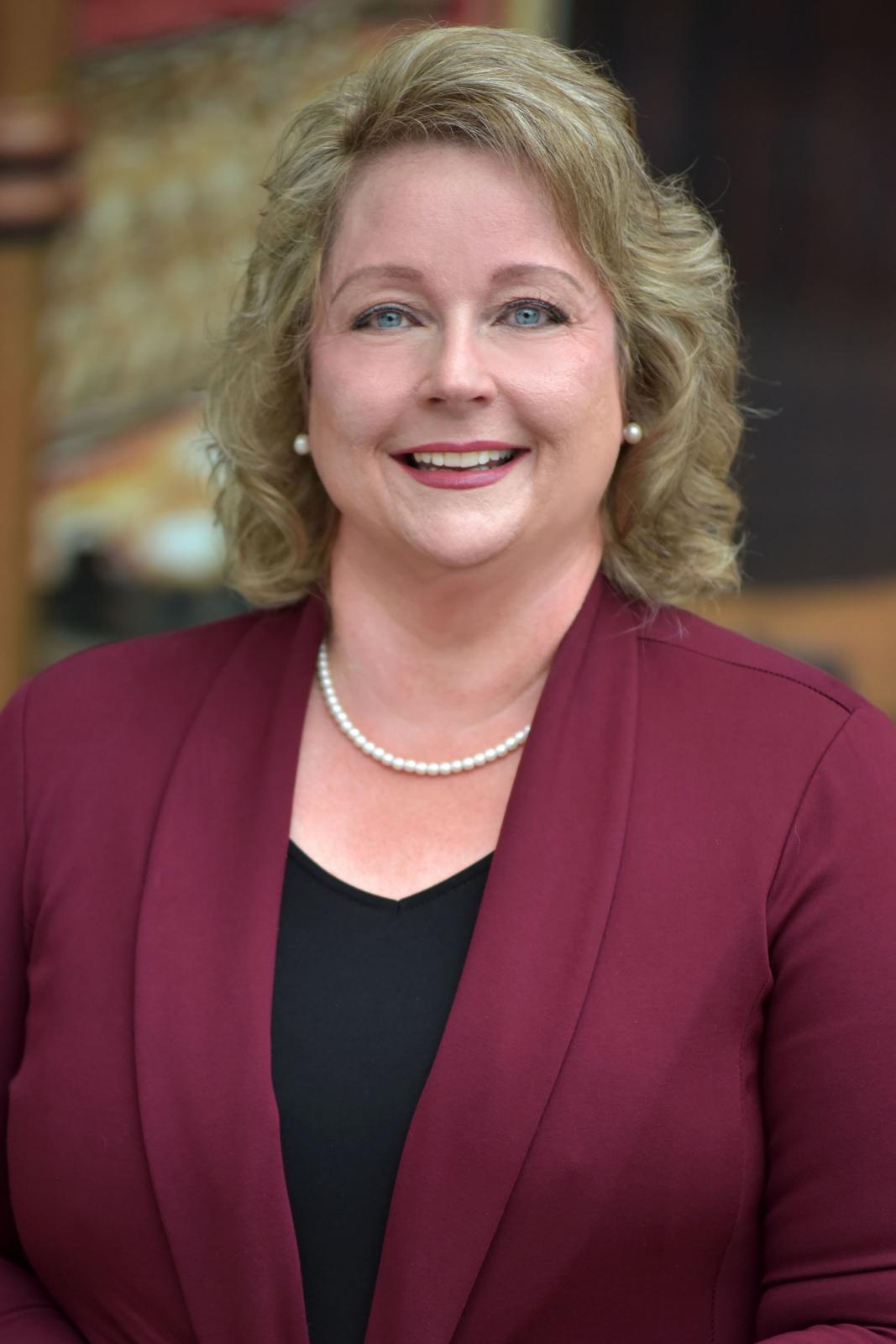 Photo of Katherine Rigdon, Assistant Professor of Nursing for MSU Meridian's Master of Science in Nursing program, smiling at camera